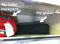 Guitar in overhead bin on plane